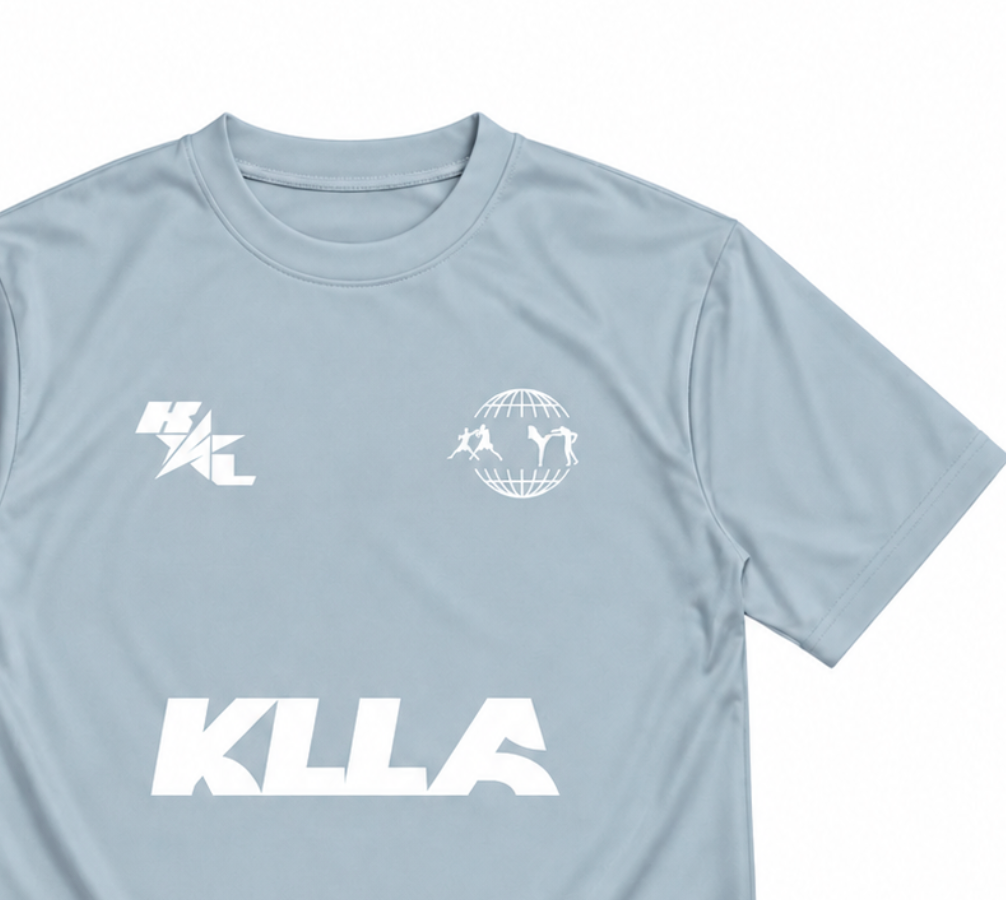 KLLA Origins Performance Tee – (Ice Blue/White)